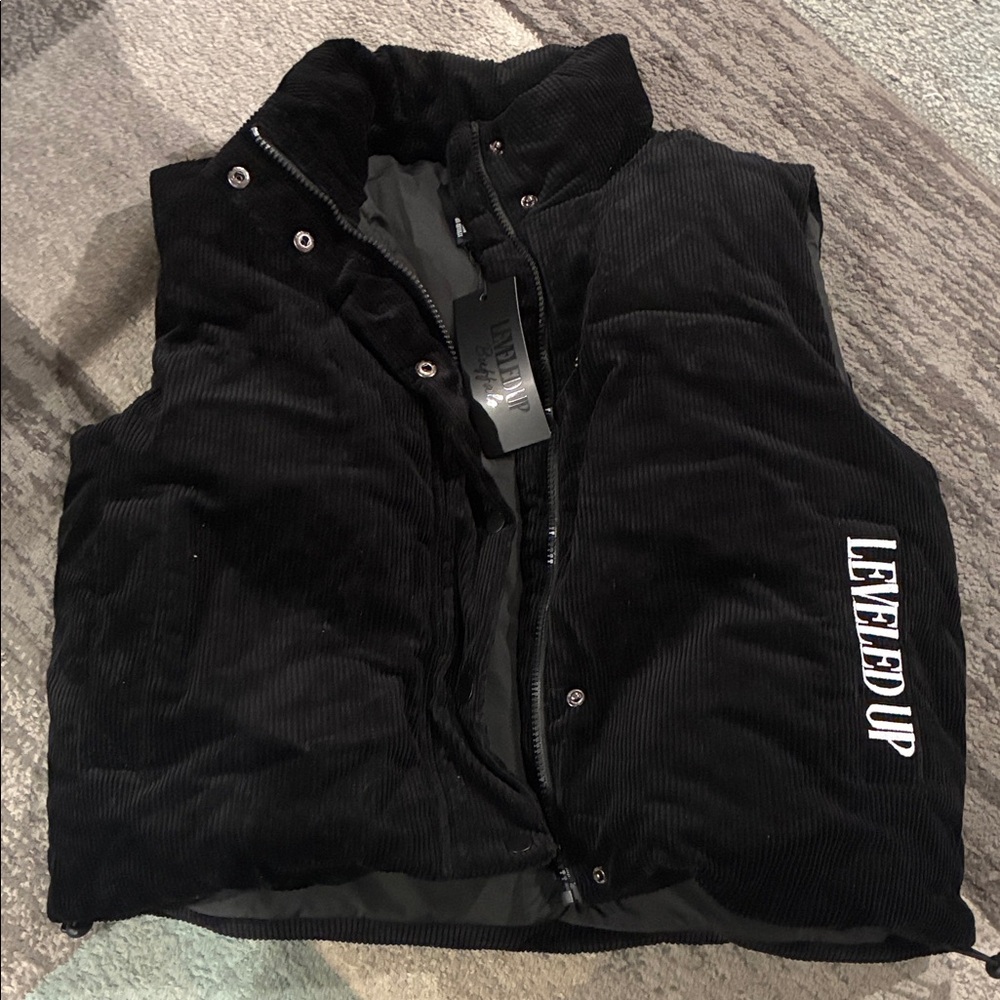 Buffalo Black Corduroy Puffer Vest with 'Leveled Up' Side Logo